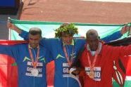 Second place Abderrahim Goumri of Ethiopia, first place Marilson Gomes dos Santos of Brazil, and third place Daniel Rono of Kenya