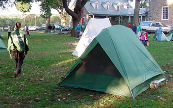 Urban Park Ranger and a tent