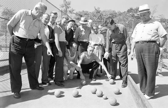 Men gather on the Crotona Park bocce courts, September 18, 1941. Courtesy of 
Parks Photo Archive, Neg. 20735