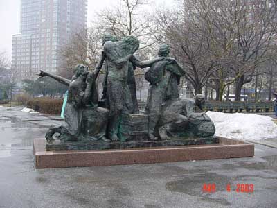 Photo of The Immigrants sculpture in Battery Park