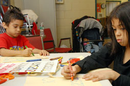 kids at an afterschool program engage in learning activities that use art to learn how to count