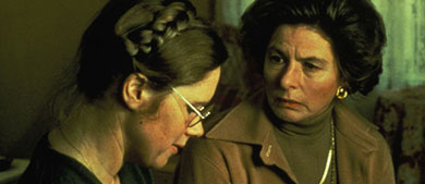 A woman speaks to another woman sitting beside her in this screenshot from the movie Autumn Sonata.