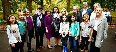 Members of the Monumental Statue Fund, electeds, and girl scouts