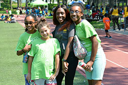 campers pose for a picture with Parks staff