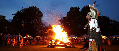 a dance around a fire outdoors