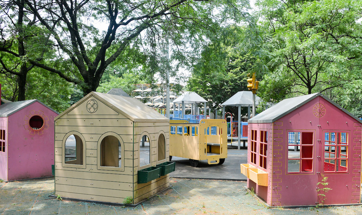 Tiny play houses, playgrounds, spray showers, swings, and slides await your kids at the giant Playground for all Children.