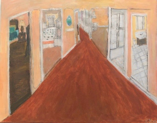 A brown hallway leads far down a hall of a house. It passes by rooms, including a bedroom and a bathroom, and another room on the left with brown floors and a lamp turned on. The walls of the hallway are salmon colored.
