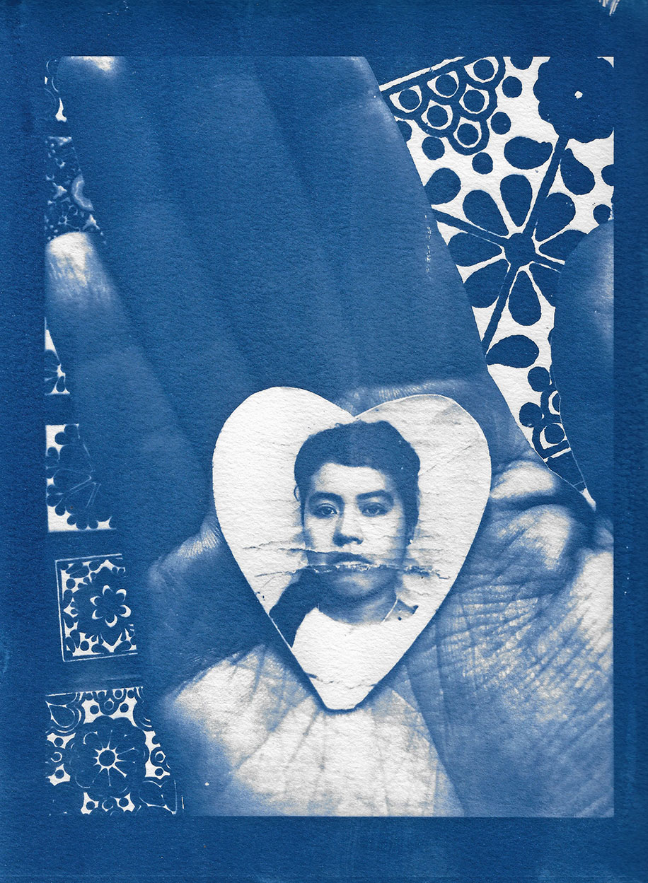 blue and white image of a close up of a hand, palm up over a florally-tiled surface. In the palm is a heart-shaped portrait of a woman