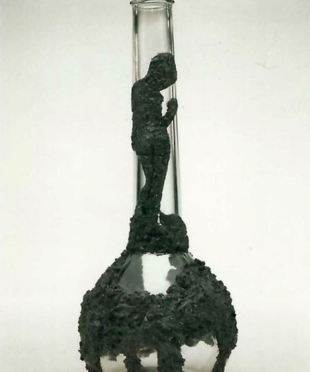mixed media of a boy holding on to the stem of a glass bottle