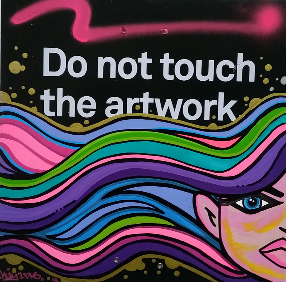 illustration of an individual with pink, green, purple, and blue hair flowing along a sign that reads Do not touch the artwork