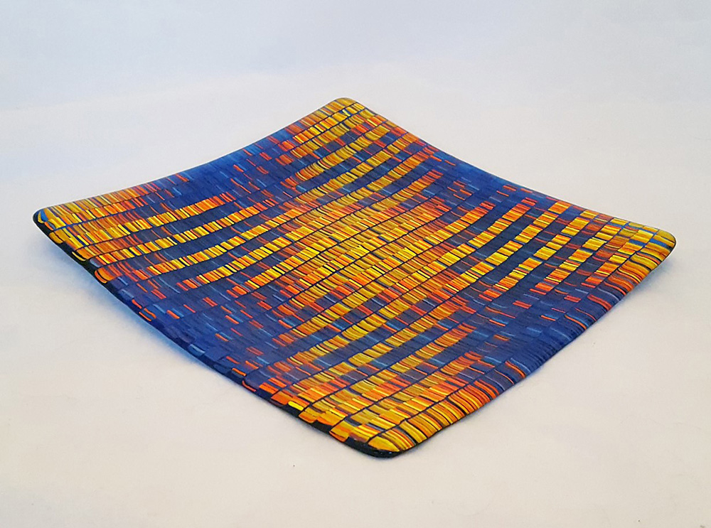 tapestry like colors of red, orange, blue