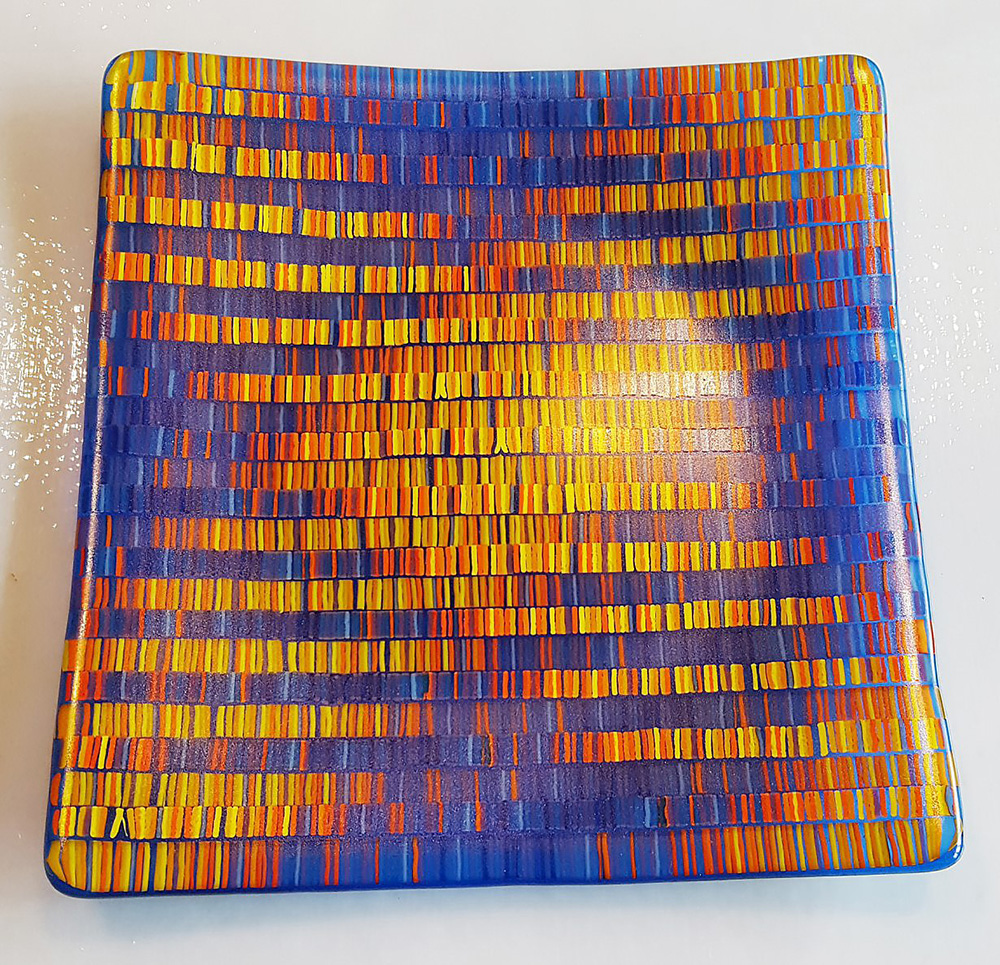 tapestry like design of blue and orange on
