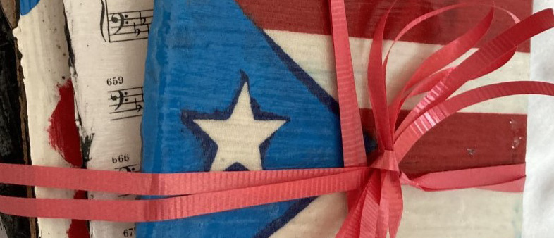 coasters decorated in the Puerto Rican flag, musical notes and tied with a red ribbon