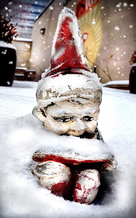 a gnome covered in snow