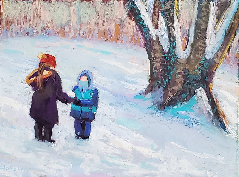 a person hands a kids a snowball while they hang out on a snow-covered hill near a tree