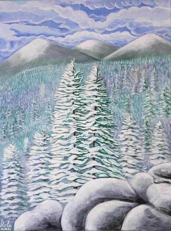 evergreen landscape covered in snow against the backdrop of three mountains capped with snow under a cloudy blue sky