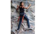 Person climbing a rock wall