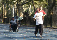 People with disabilities sporting in a park