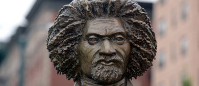 Frederick Douglass statue in a park